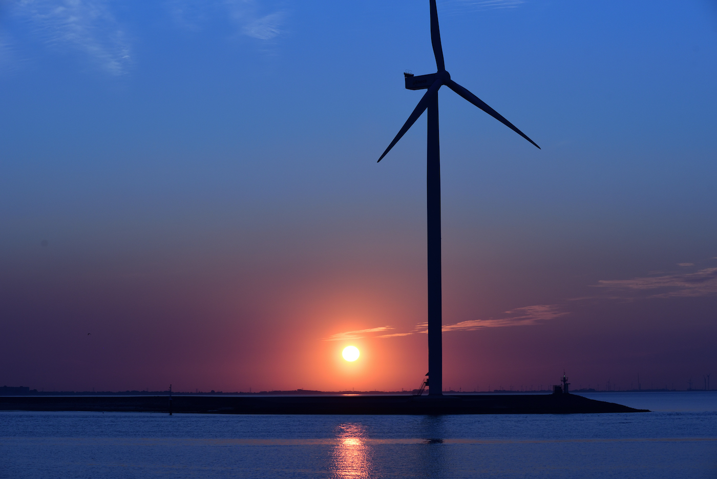 Zonsondergang pier van Oterdum